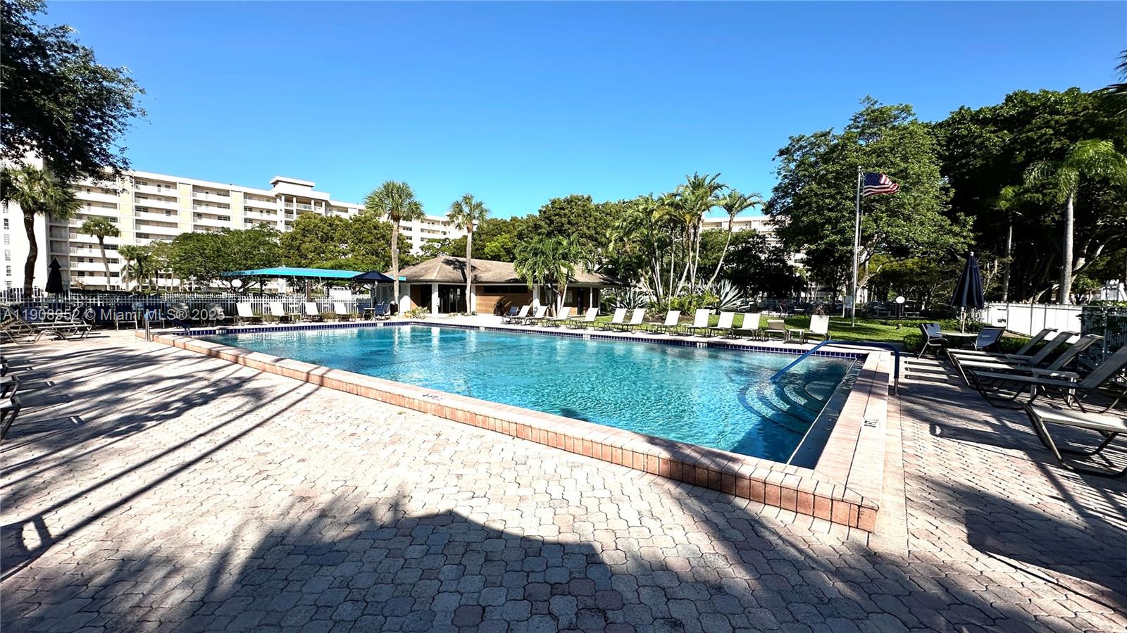 2651 South Course Drive, Unit 307 Pompano Beach, FL 33069 - Photo 26 of 33 a view of a lake with a city