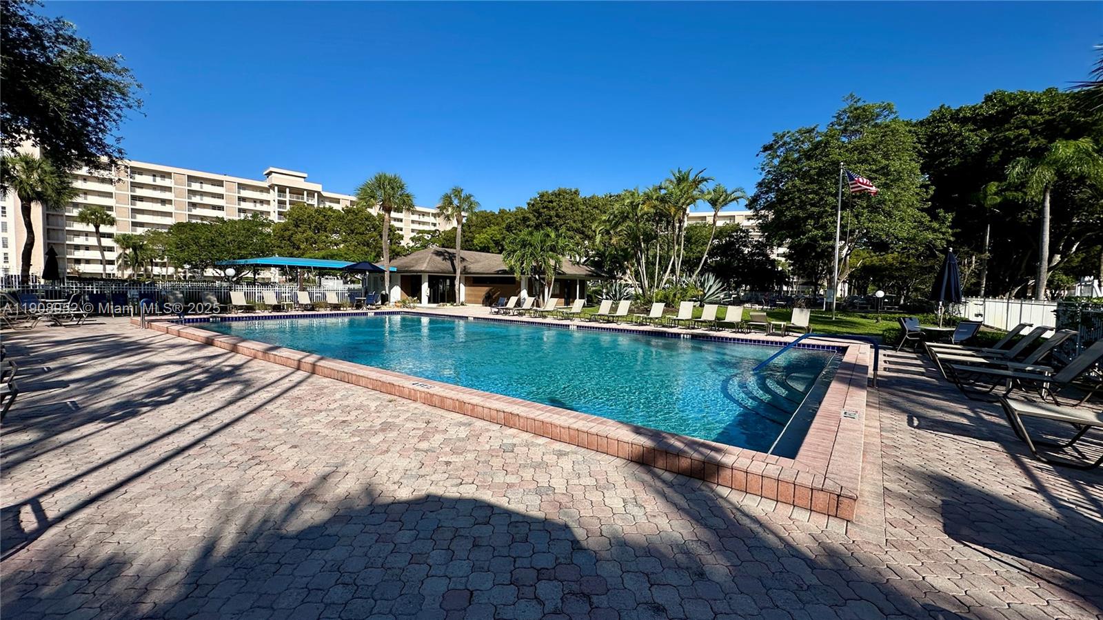 2651 South Course Drive, Unit 307 Pompano Beach, FL 33069 - Photo 27 of 33 a view of a lake with a city