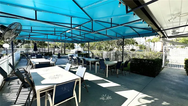 a view of outdoor space with chairs