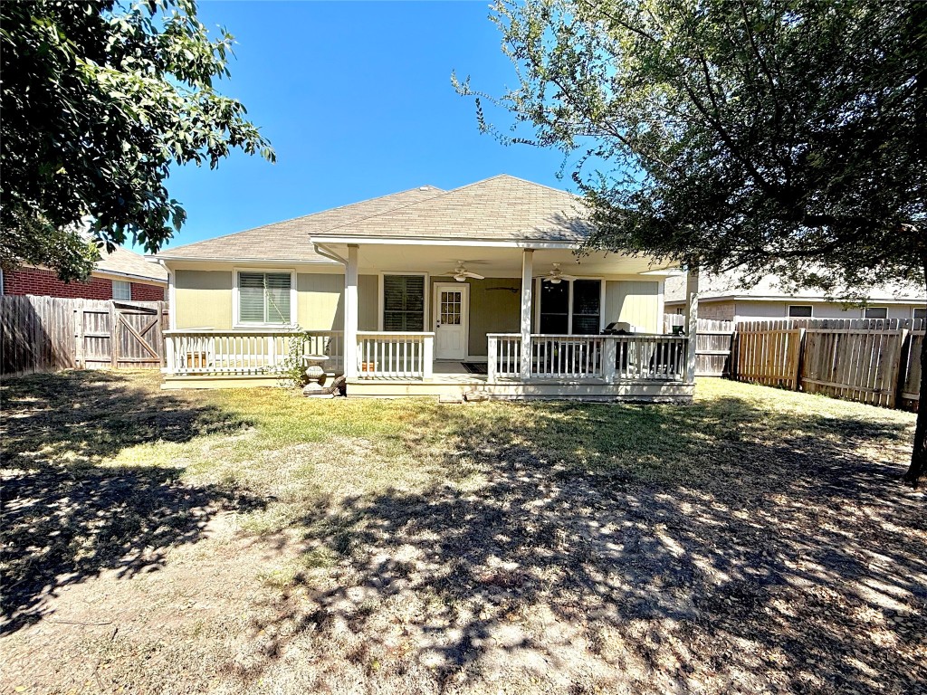 1511 Freestone Drive Pflugerville, TX 78660 - Photo 5 of 12 a front view of a house with a yard