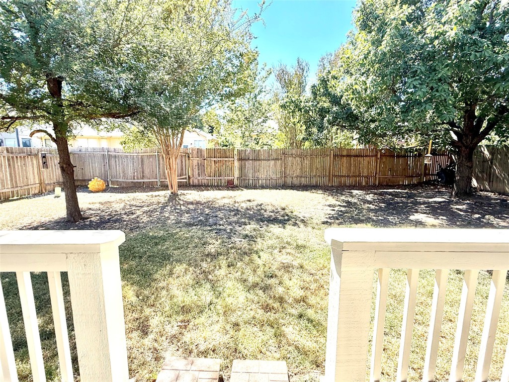 1511 Freestone Drive Pflugerville, TX 78660 - Photo 6 of 12 a view of a backyard of the house