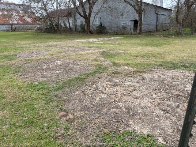 412 Williams Road Sealy, TX 77474 - Photo 2 of 5 a view of a yard with a house