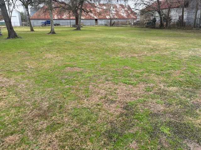 412 Williams Road Sealy, TX 77474 - Photo 4 of 5 a view of outdoor space with deck and yard