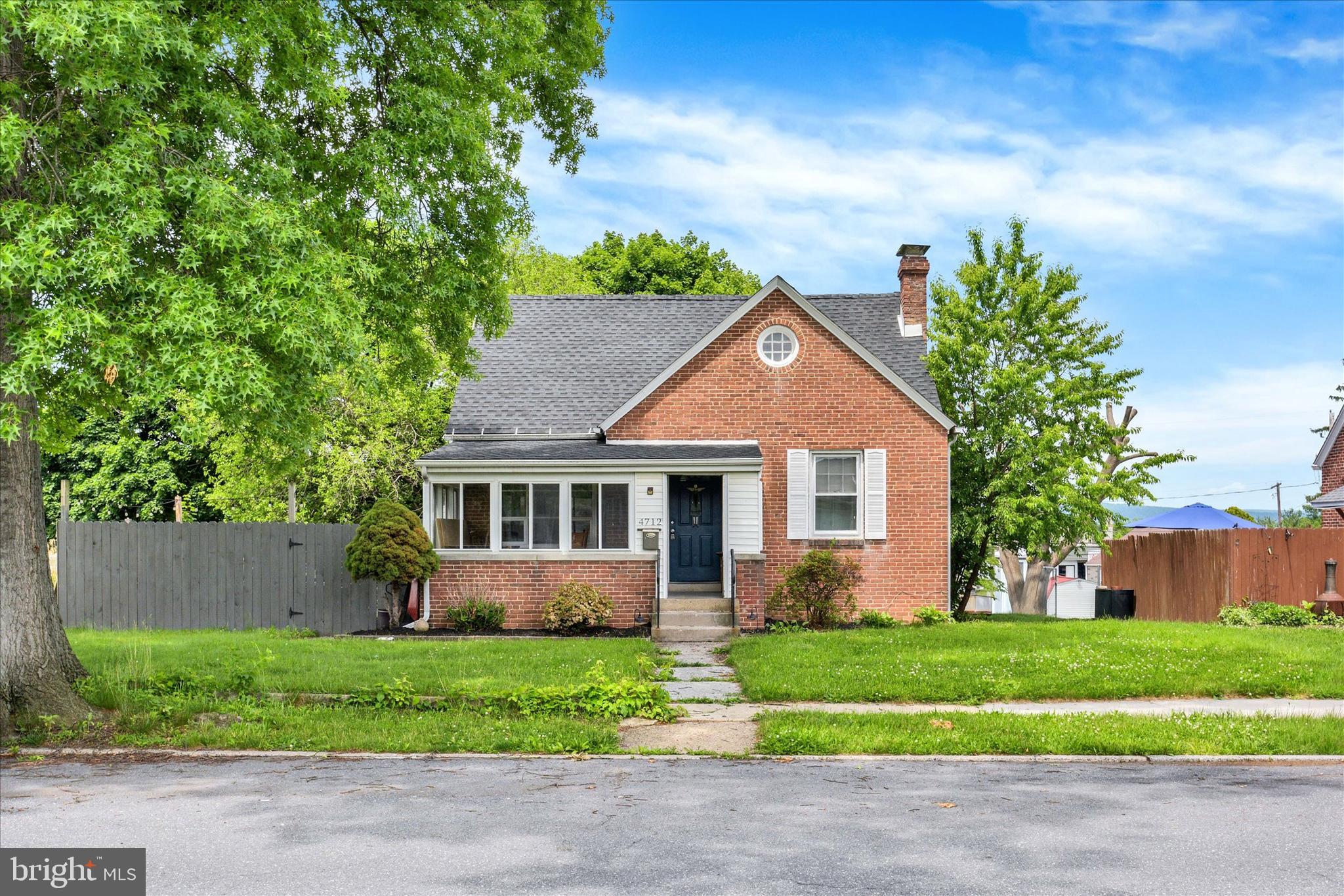 4712 Ruth Ann Street Harrisburg, PA 17109 - Photo 23 of 26 front view of house with a yard