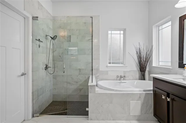 a view of staircase with railing and white walls