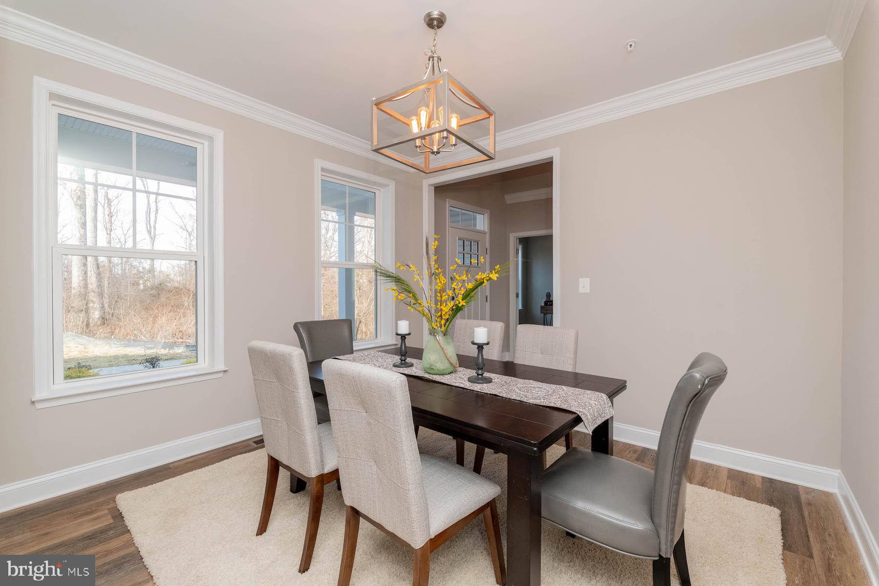 Margate York Road Parkton, MD 21120 - Photo 12 of 21 a dining room with furniture a chandelier and wooden floor