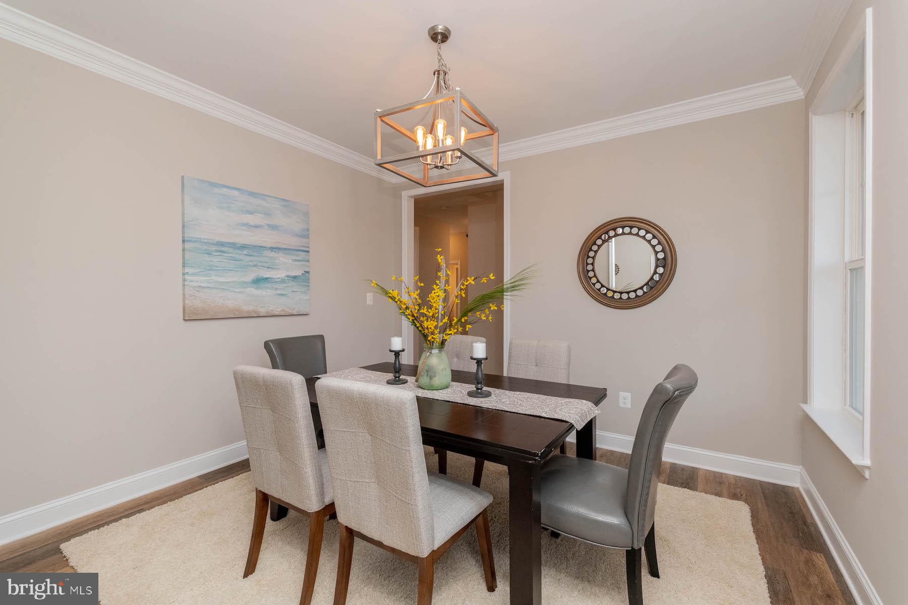 Margate York Road Parkton, MD 21120 - Photo 13 of 21 a view of a dining room with furniture and a chandelier