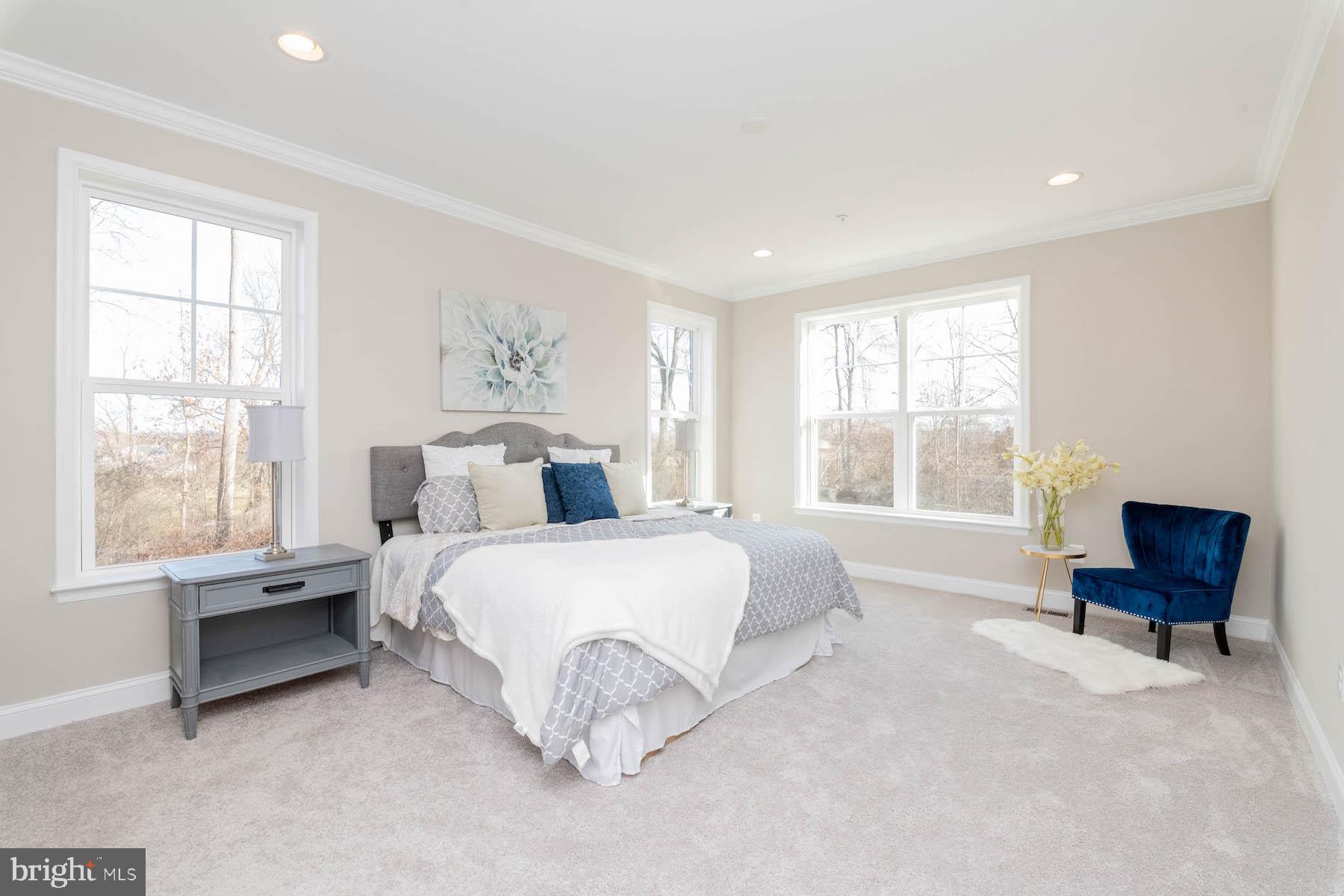 Margate York Road Parkton, MD 21120 - Photo 14 of 21 a spacious bedroom with a bed and a chair