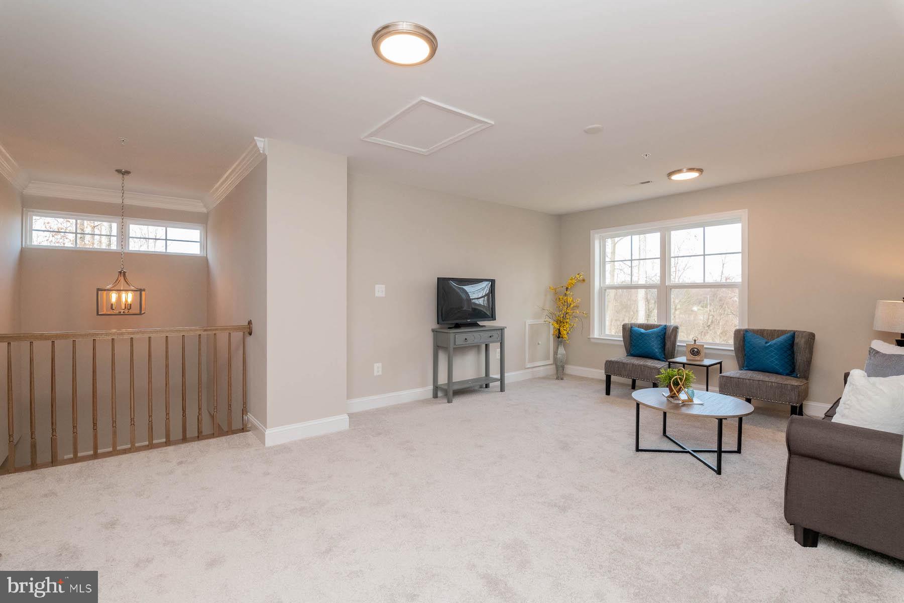 Margate York Road Parkton, MD 21120 - Photo 20 of 21 a living room with furniture and a flat screen tv