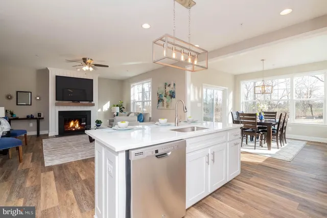 a view of a kitchen and dining room