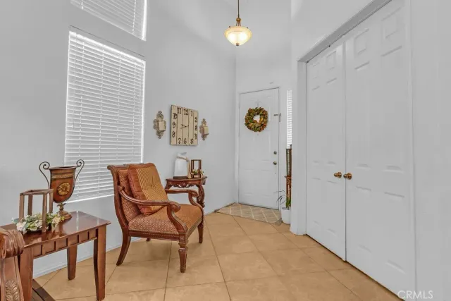 a view of a livingroom with furniture and window