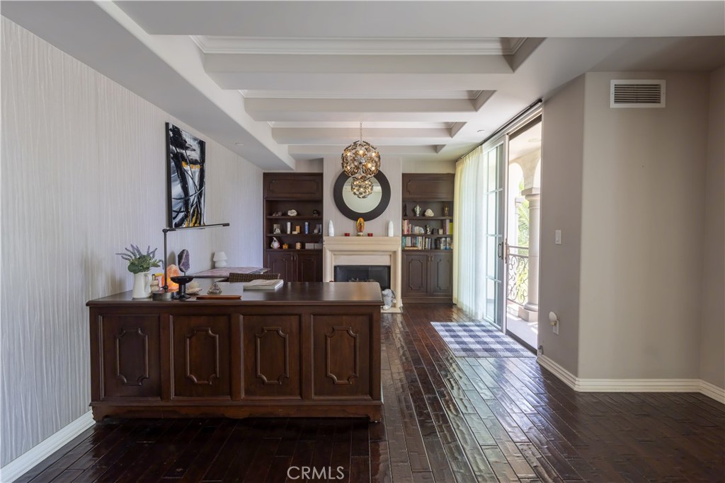 10795 Wilshire Boulevard, Unit 402 Los Angeles, CA 90024 - Photo 7 of 20 a view of a hallway with wooden floor