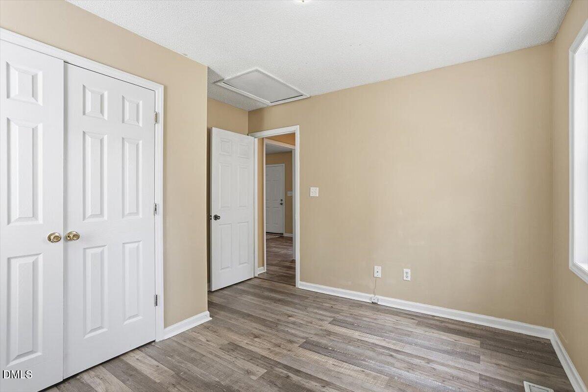 1013 Spawn Place Knightdale, NC 27545 - Photo 22 of 22 wooden floor in an empty room
