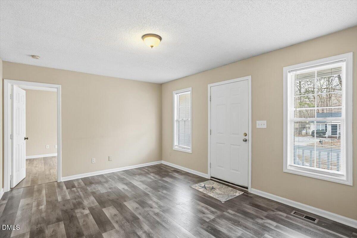 1013 Spawn Place Knightdale, NC 27545 - Photo 10 of 22 a view of an empty room and window