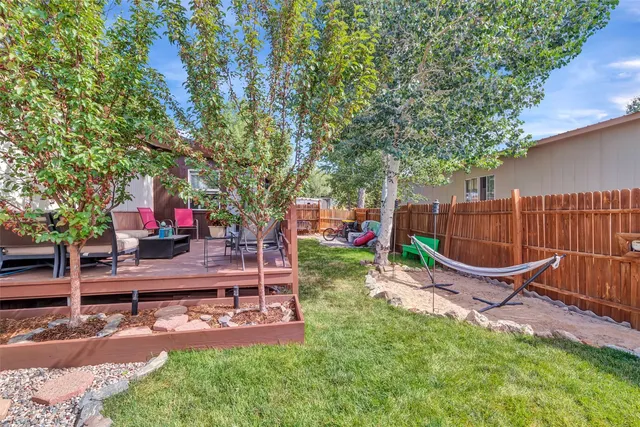 a garden view with a seating space