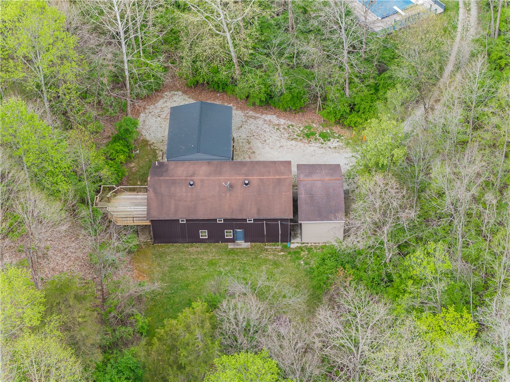 6750 Little Twin Road Germantown, OH 45327 - Photo 73 of 88 Perched amidst a verdant landscape, this property features a large deck and ample outdoor space.