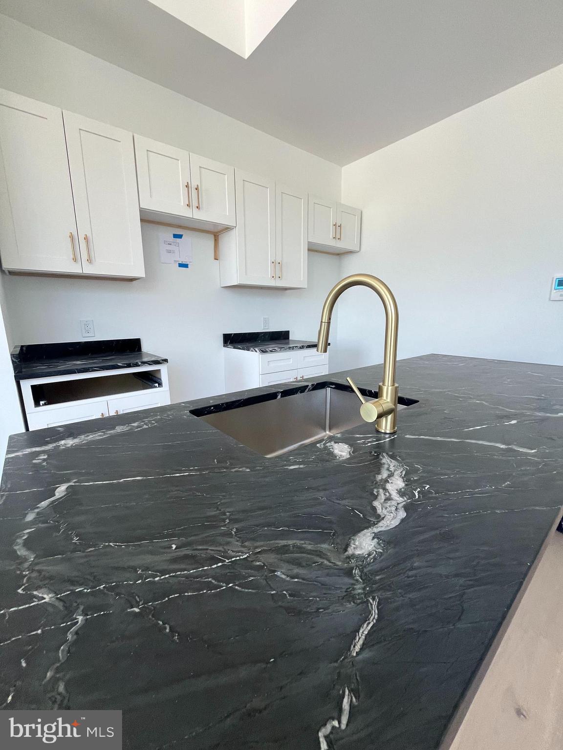 36 North Narberth Avenue, Unit 2D Narberth, PA 19072 - Photo 5 of 10 a close view of sink and tap