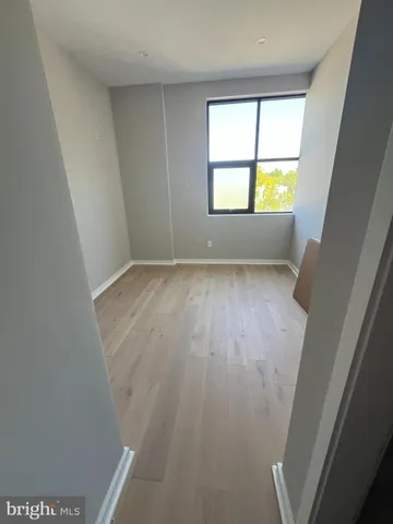 an empty room with window