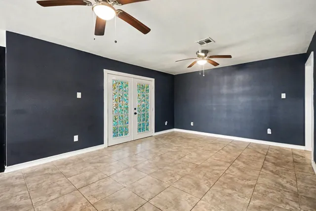a view of entryway with wooden floor and stairs