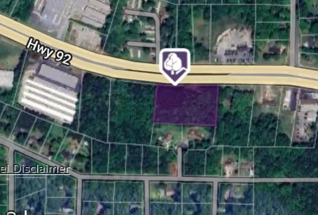 a view of a door and a window