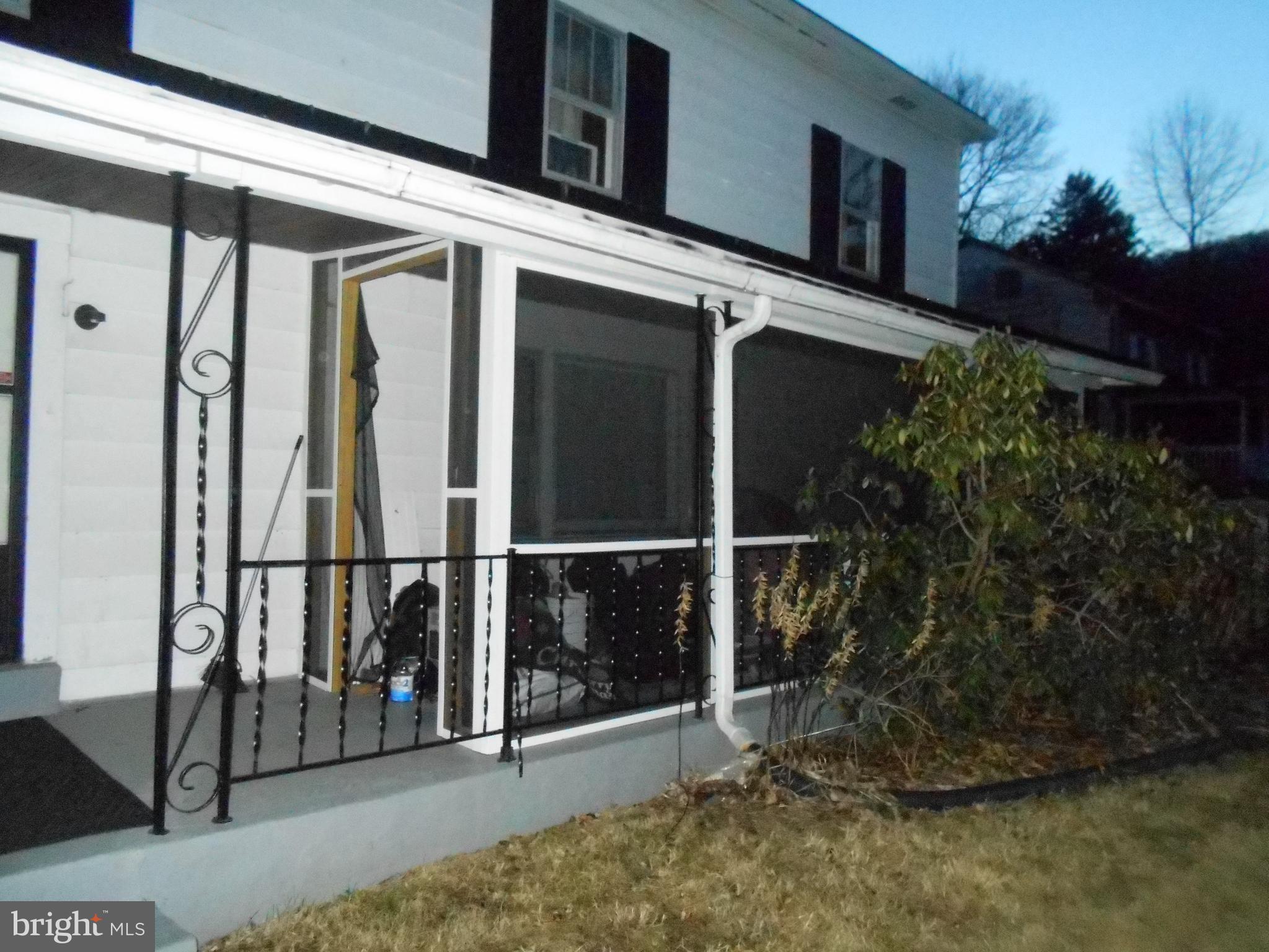 2157 Reed Road Knoxville, MD 21758 - Photo 4 of 17 SCREENED IN FRONT PORCH