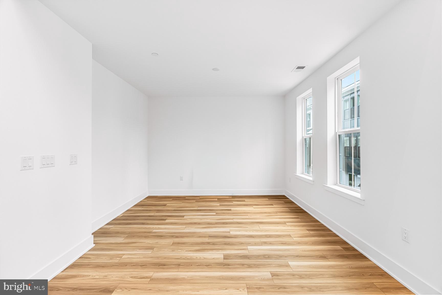 10206 Donatello Drive Princeton, NJ 08540 - Photo 15 of 30 a view of an empty room with wooden floor and a window