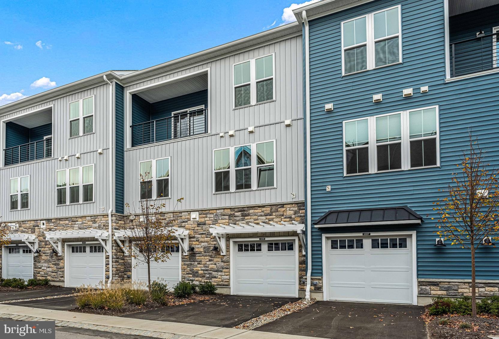 10206 Donatello Drive Princeton, NJ 08540 - Photo 2 of 30 a front view of a building with a road