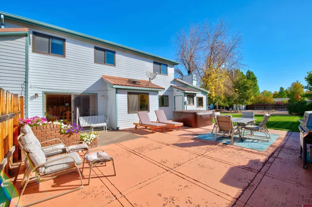 a outdoor space with the couches and dining table chair