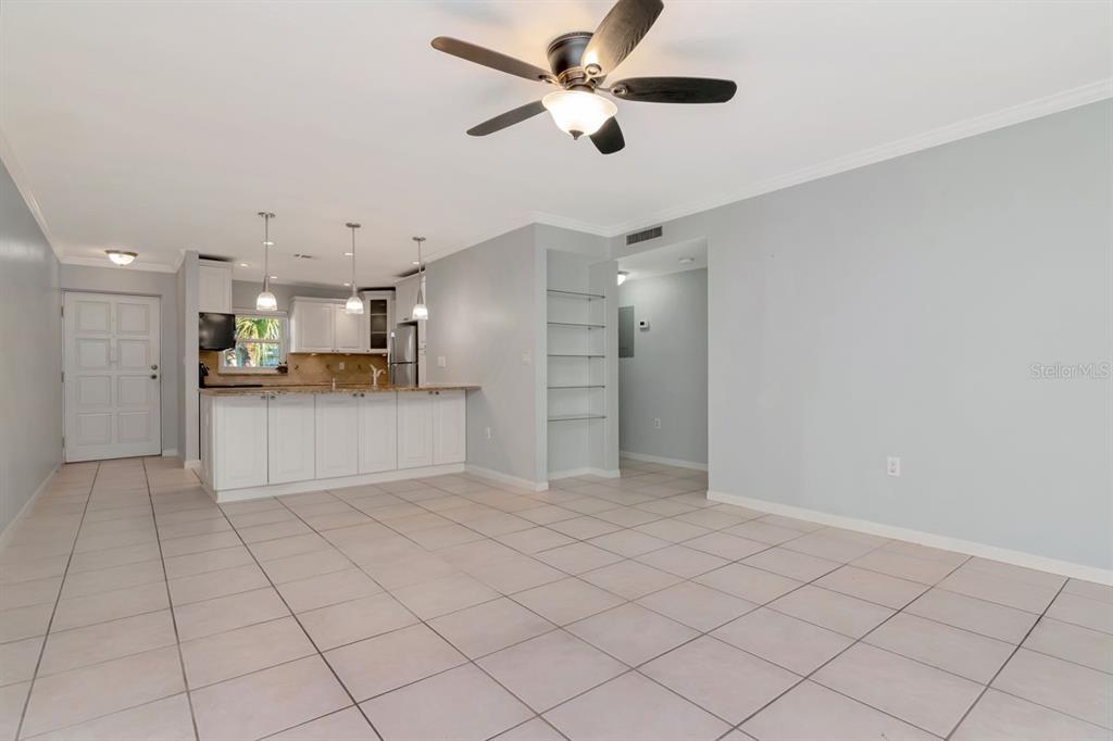 2650 Countryside Boulevard, Unit F303 Clearwater, FL 33761 - Photo 25 of 39 a view of a kitchen with a sink and cabinets