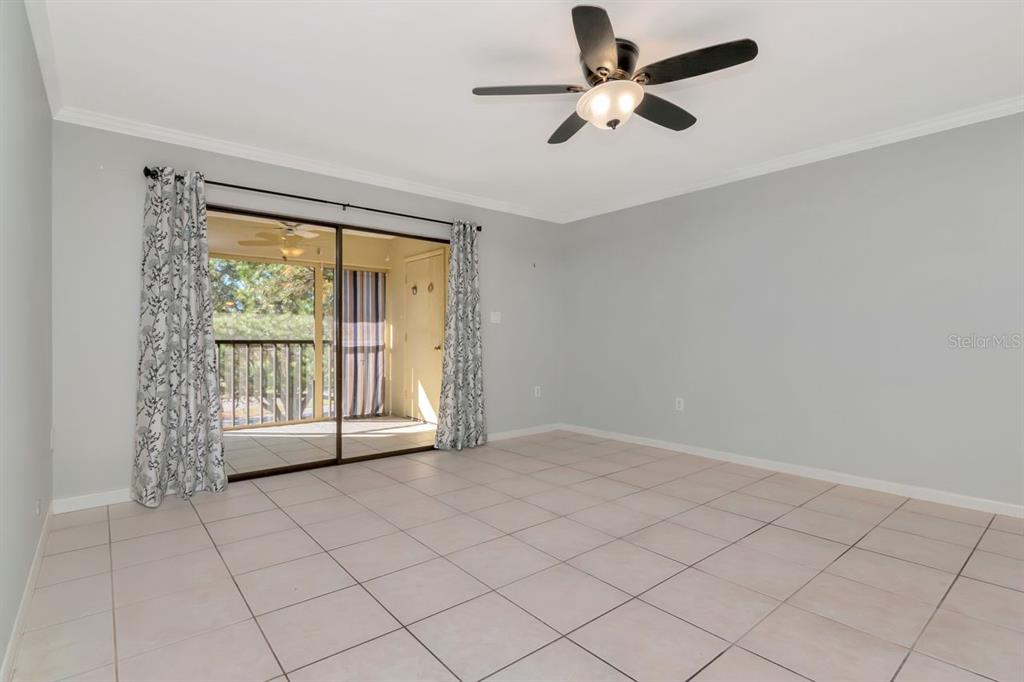 2650 Countryside Boulevard, Unit F303 Clearwater, FL 33761 - Photo 28 of 39 a view of an empty room with a window