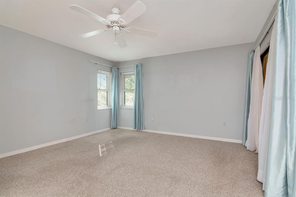2650 Countryside Boulevard, Unit F303 Clearwater, FL 33761 - Photo 29 of 39 a view of an empty room with a window