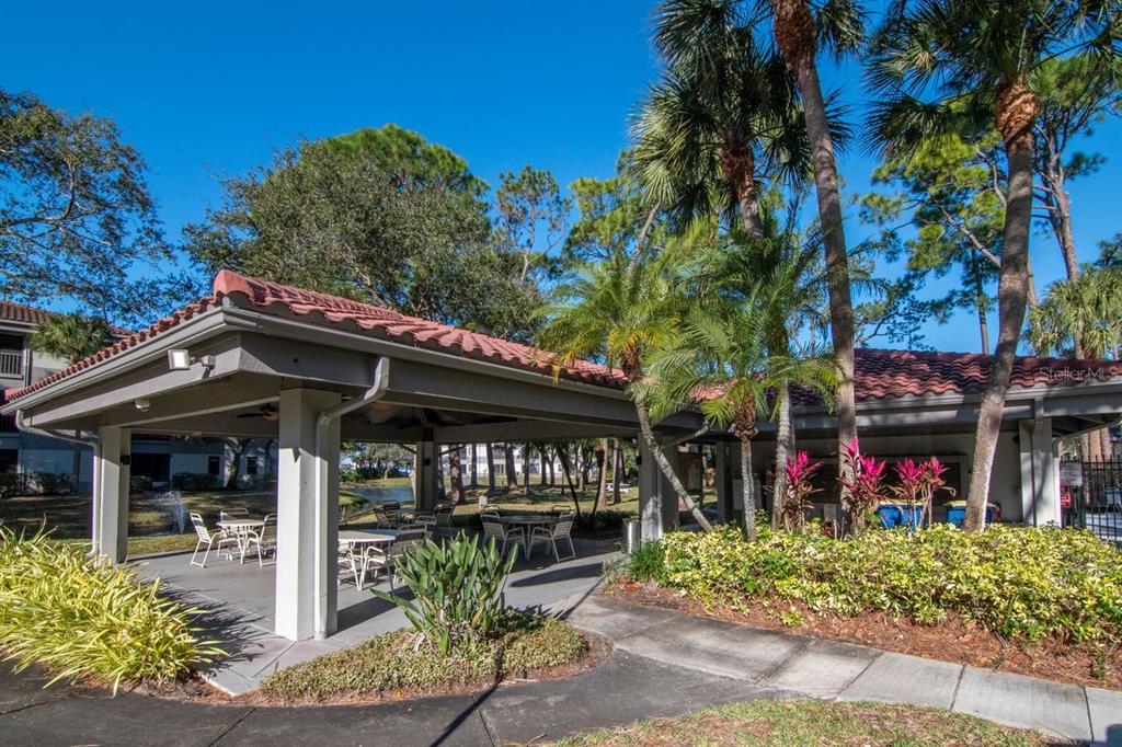 2650 Countryside Boulevard, Unit F303 Clearwater, FL 33761 - Photo 3 of 39 a view of street with sitting area