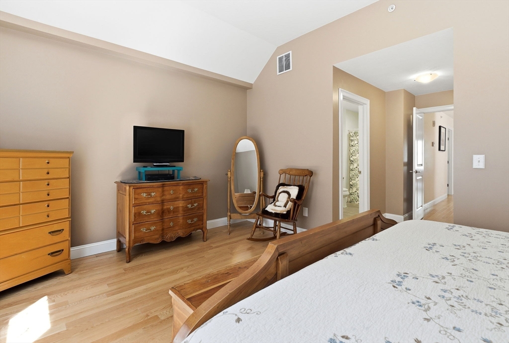 6 Trail Ridge Way, Unit D Harvard, MA 01451 - Photo 24 of 28 a view of a workspace with furniture and a flat screen tv
