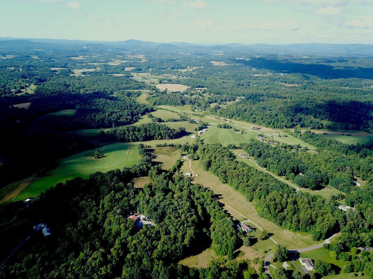 0 Burgess Road Boones Mill, VA 24065 - Photo 2 of 11 an aerial view of residential house with outdoor space and trees all around