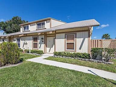 211 Maplecrest Circle Jupiter, FL 33458 - Photo 3 of 21 Front