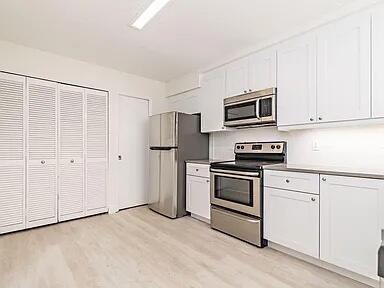 211 Maplecrest Circle Jupiter, FL 33458 - Photo 6 of 21 211 Maplecrest Kit 2