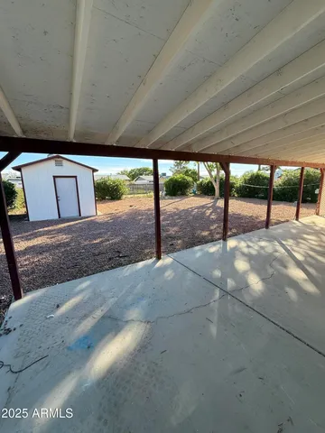 a view of a porch with chairs