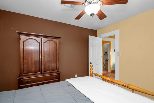 a bathroom with a sink and a window