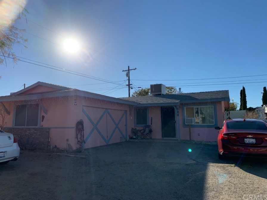 a car parked in front of a house