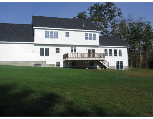 1165 Hill Road Boxborough, MA 01719 - Photo 7 of 10 a house view with a garden space