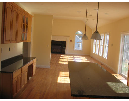 1165 Hill Road Boxborough, MA 01719 - Photo 10 of 10 a open kitchen with refrigerator and window