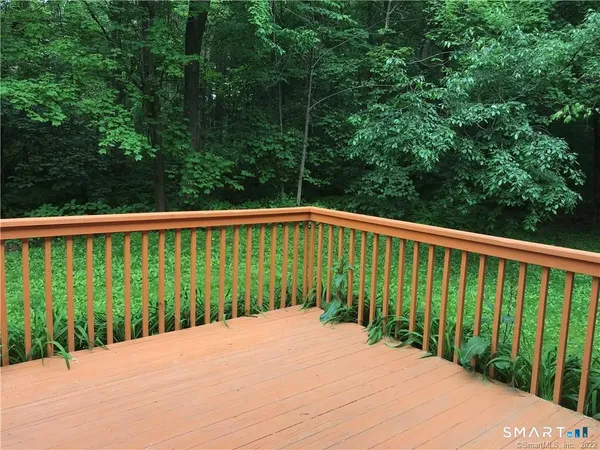 a view of a wooden roof deck