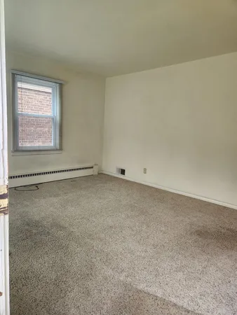 an empty room with a natural light