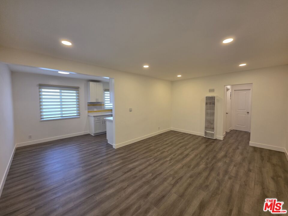 707 Strand Street, Unit 3 Santa Monica, CA 90405 - Photo 1 of 42 a view of empty room with wooden floor and window