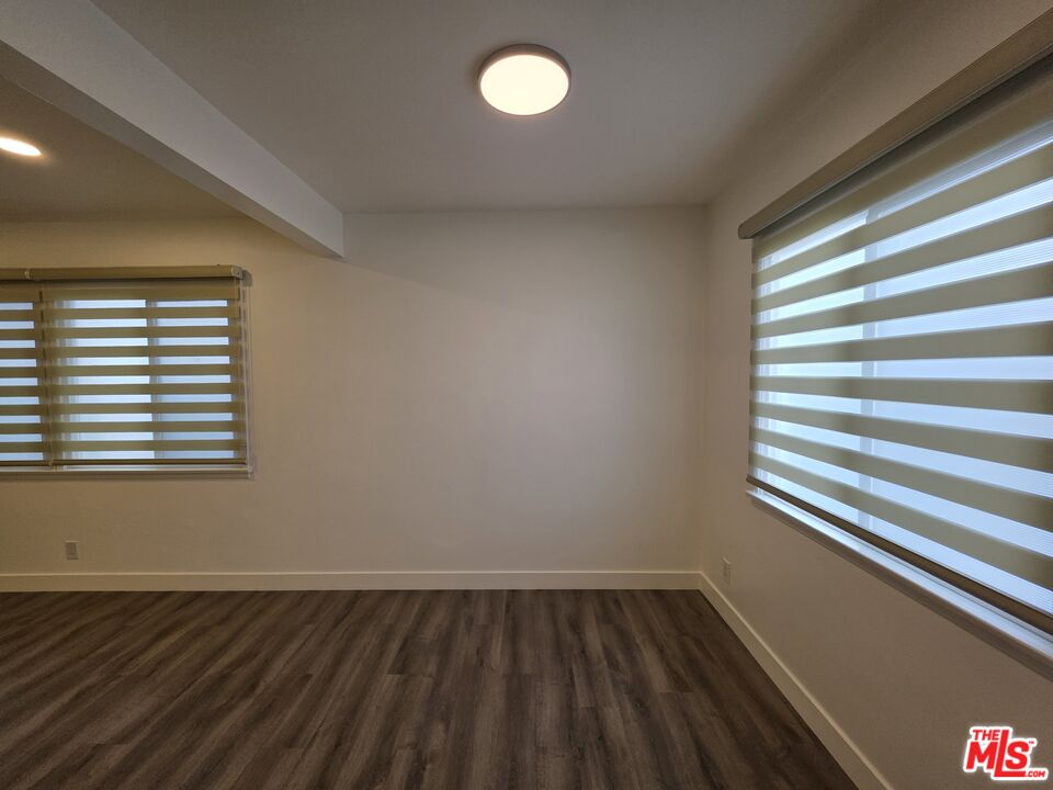 707 Strand Street, Unit 3 Santa Monica, CA 90405 - Photo 16 of 42 a view of empty room with wooden floor and fan