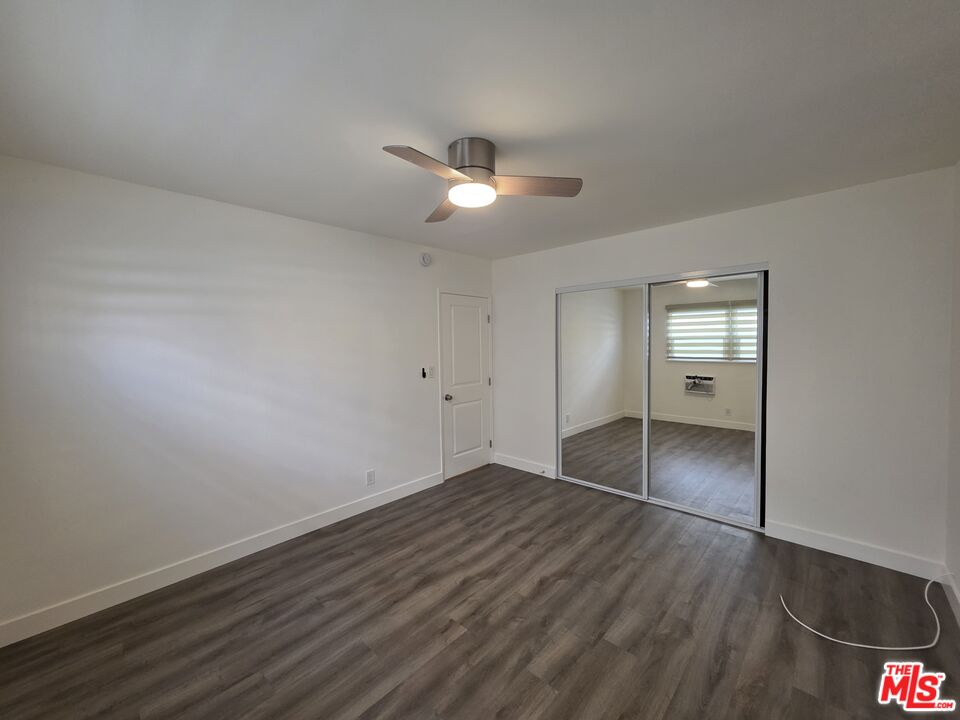 707 Strand Street, Unit 3 Santa Monica, CA 90405 - Photo 32 of 42 wooden floor in an empty room with a window