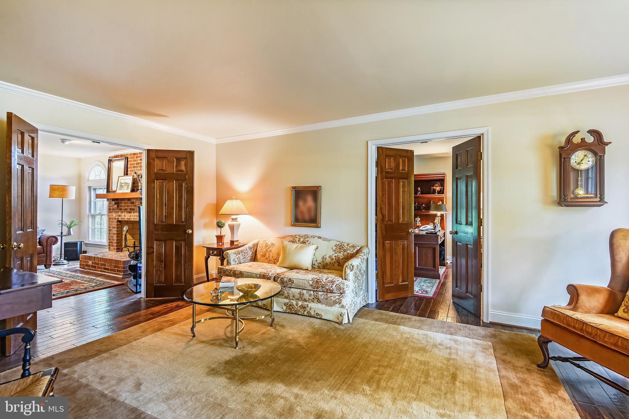 11949 Grey Squirrel Lane Reston, VA 20194 - Photo 17 of 65 Living room view into library and fam. room