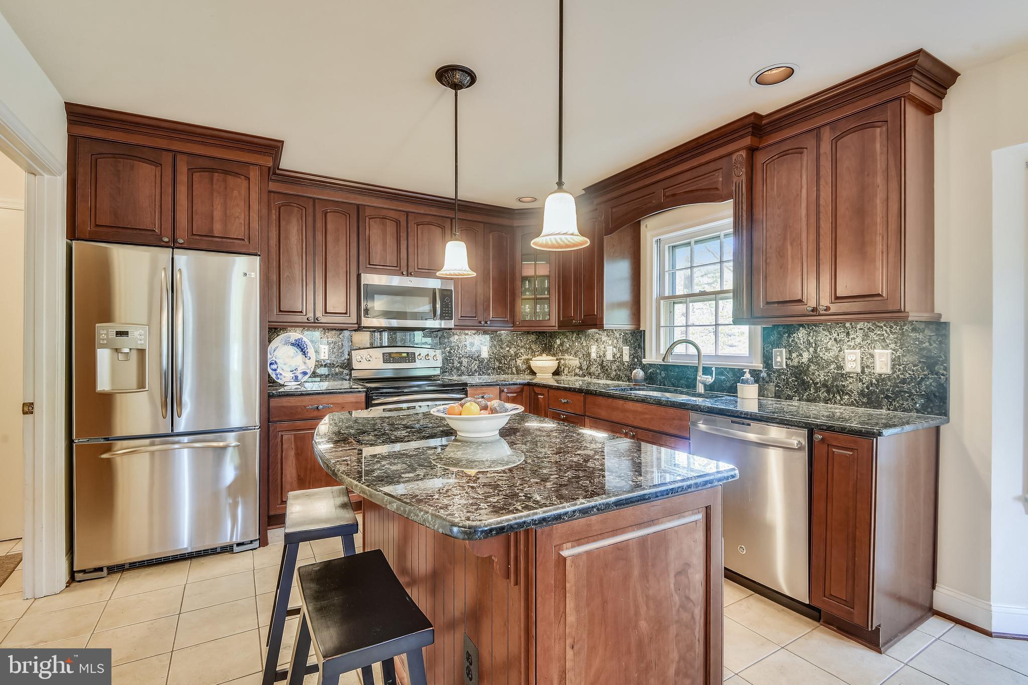 11949 Grey Squirrel Lane Reston, VA 20194 - Photo 7 of 65 Renovated kitchen with stainless, 42" cabinets
