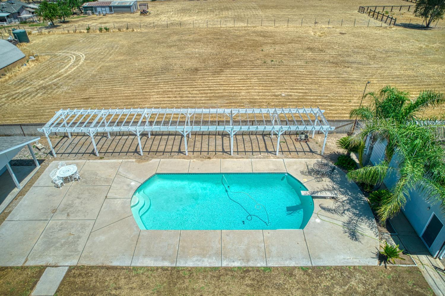 5578 Perrin Road Clovis, CA 93619 - Photo 14 of 62 a view of a swimming pool