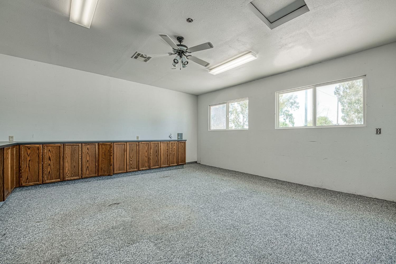 5578 Perrin Road Clovis, CA 93619 - Photo 16 of 62 a view of an empty room with a window